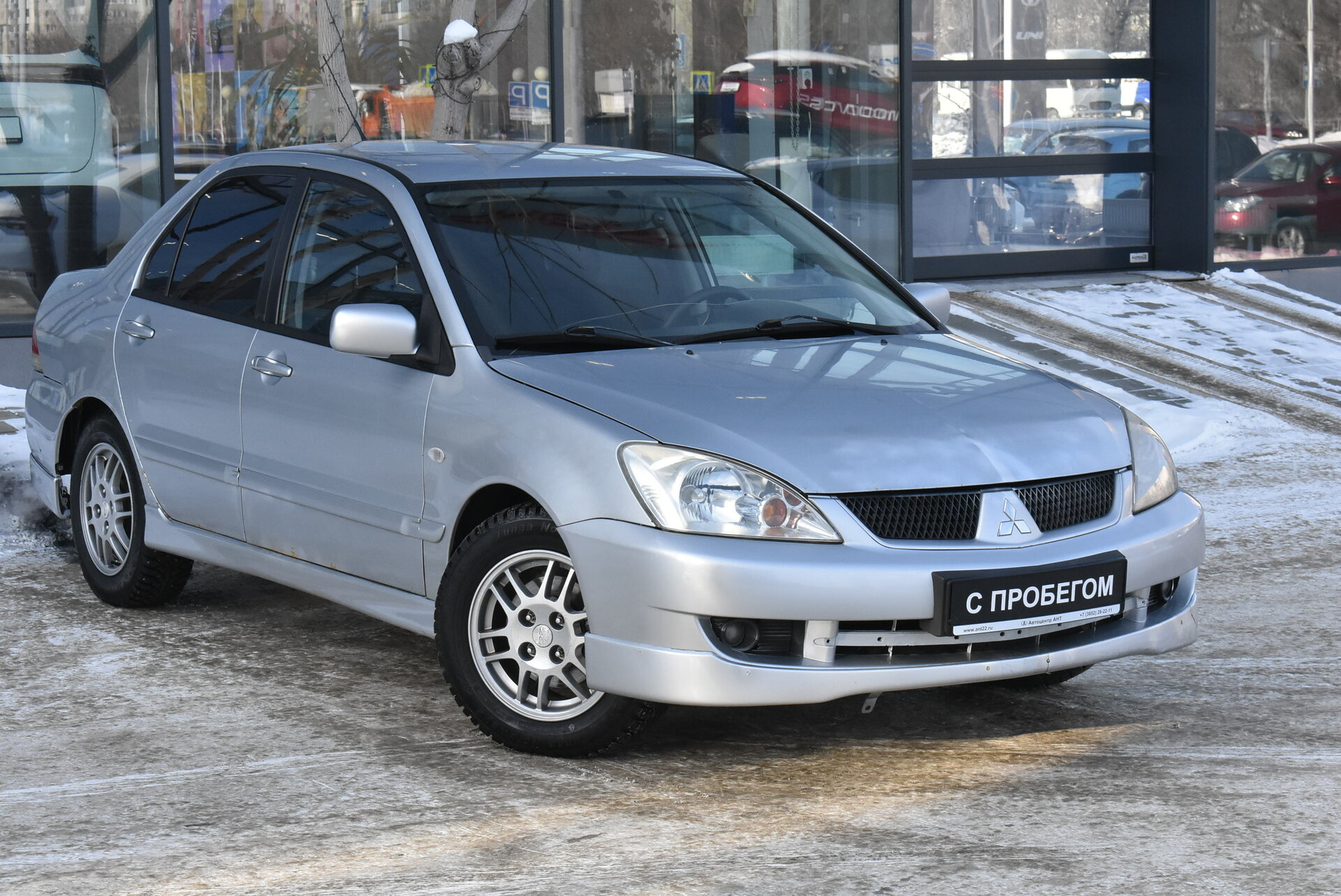 Mitsubishi Lancer, IX Рестайлинг 1.6 AT (98 л.с.) 2006