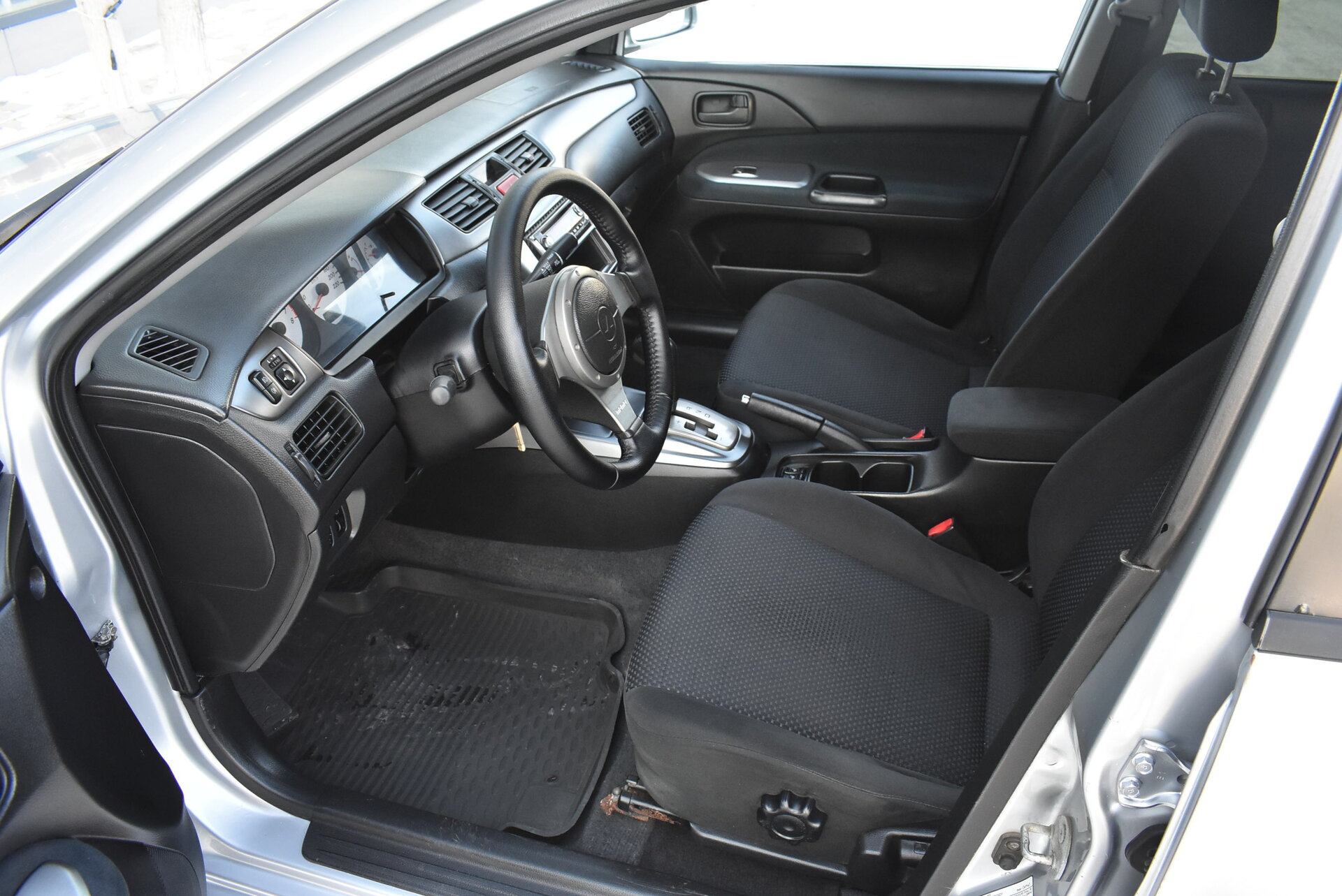 Mitsubishi Lancer, IX Рестайлинг 1.6 AT (98 л.с.) 2006