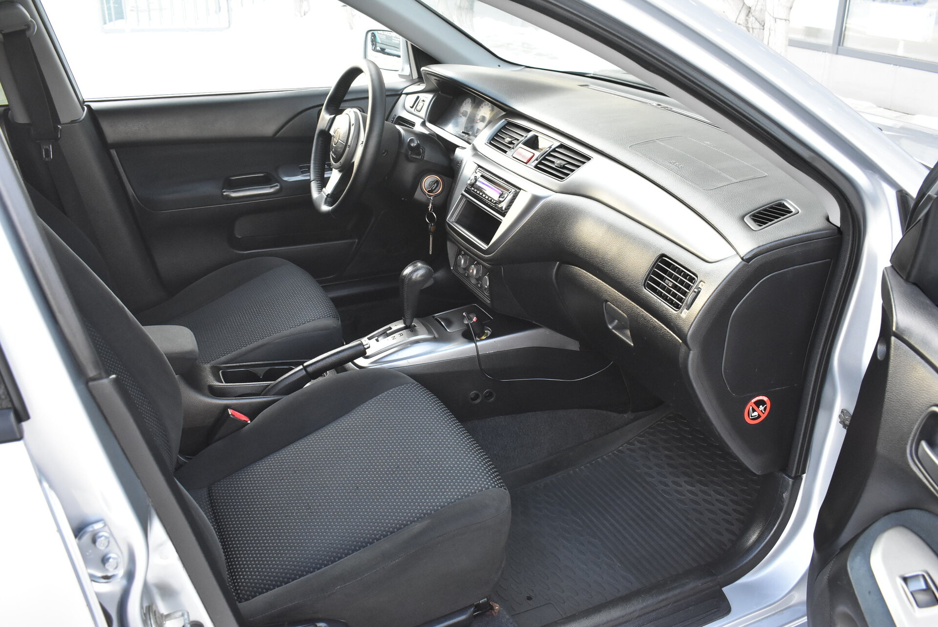 Mitsubishi Lancer, IX Рестайлинг 1.6 AT (98 л.с.) 2006