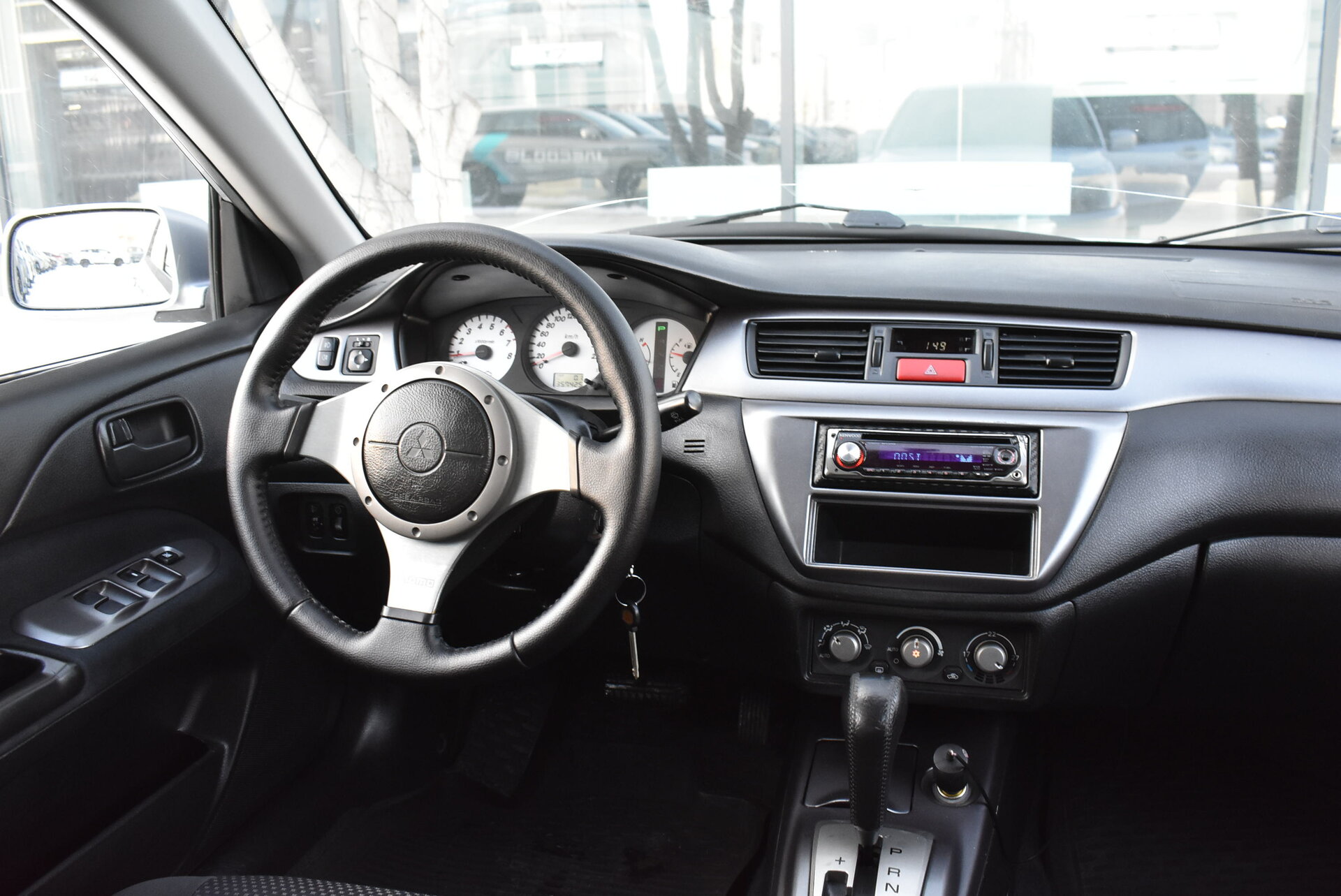 Mitsubishi Lancer, IX Рестайлинг 1.6 AT (98 л.с.) 2006