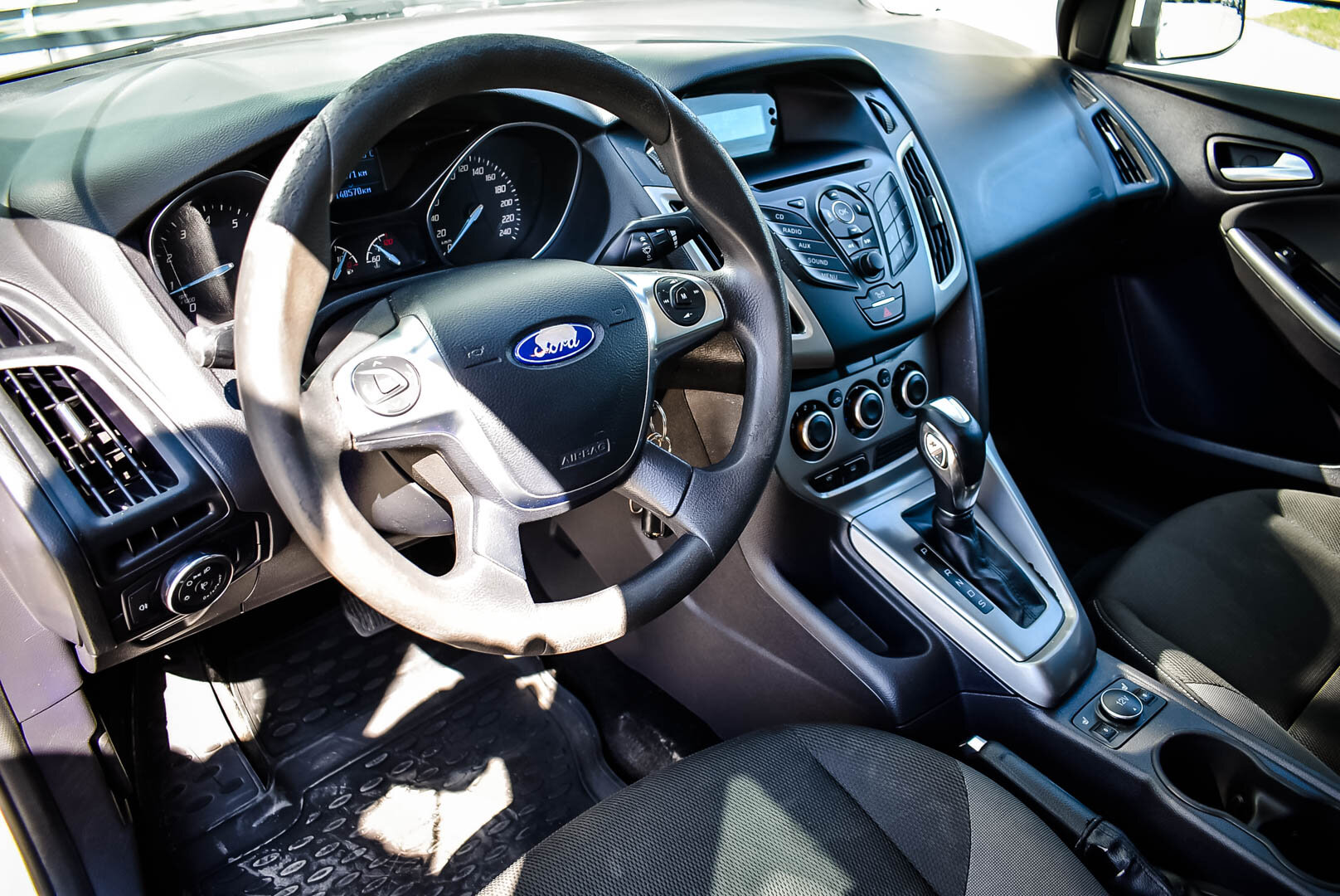 Ford Focus, III 1.6 AMT (105 л.с.) 2012