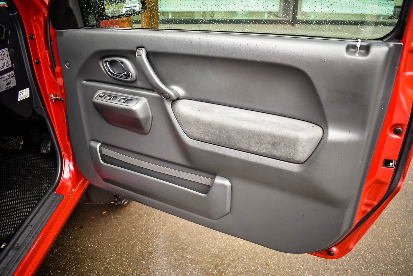 Suzuki Jimny, III Рестайлинг 2 Kei car 0.7 AT (64 л.с.) 4WD 2012