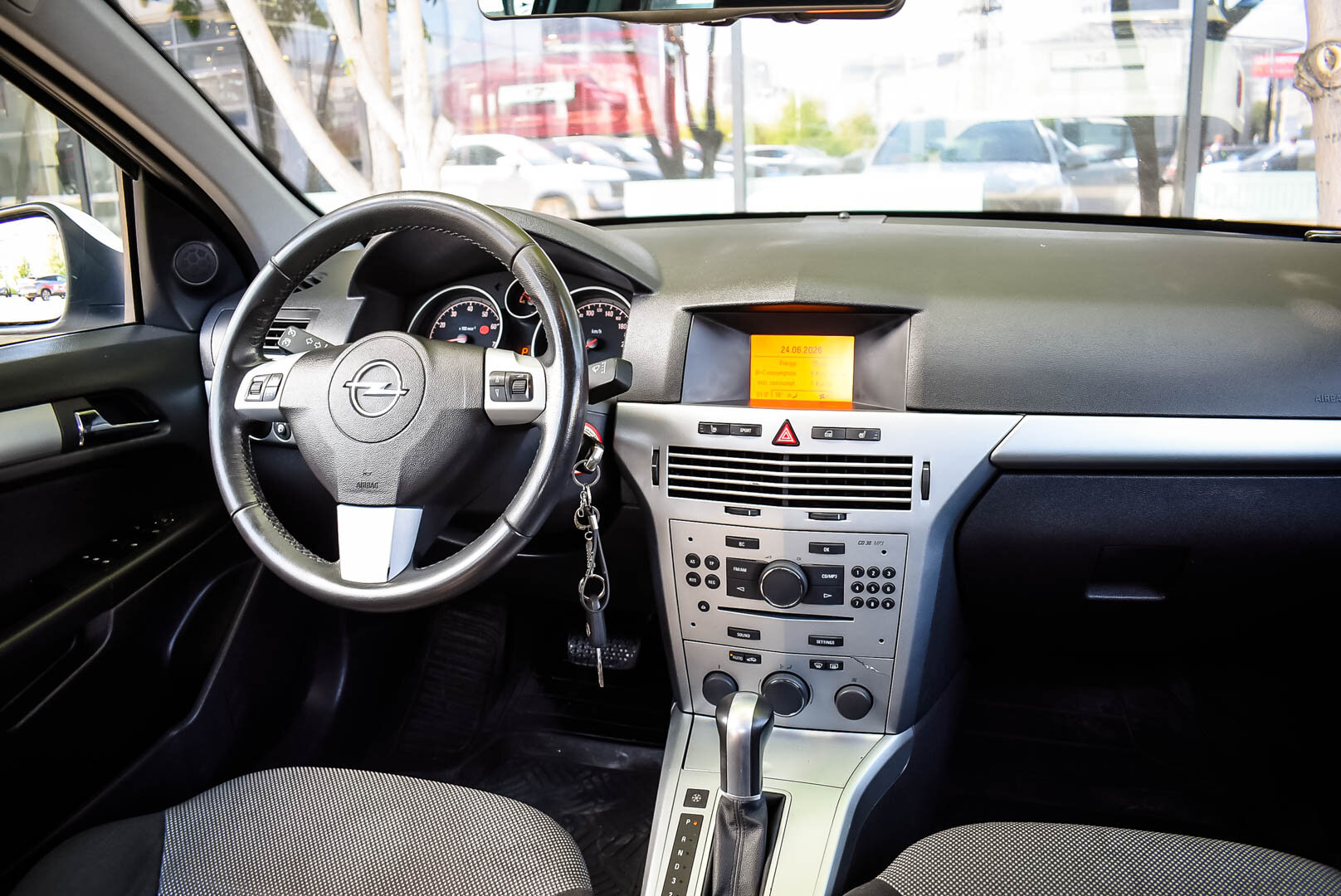 Opel Astra, H Рестайлинг 1.8 AT (140 л.с.) 2012