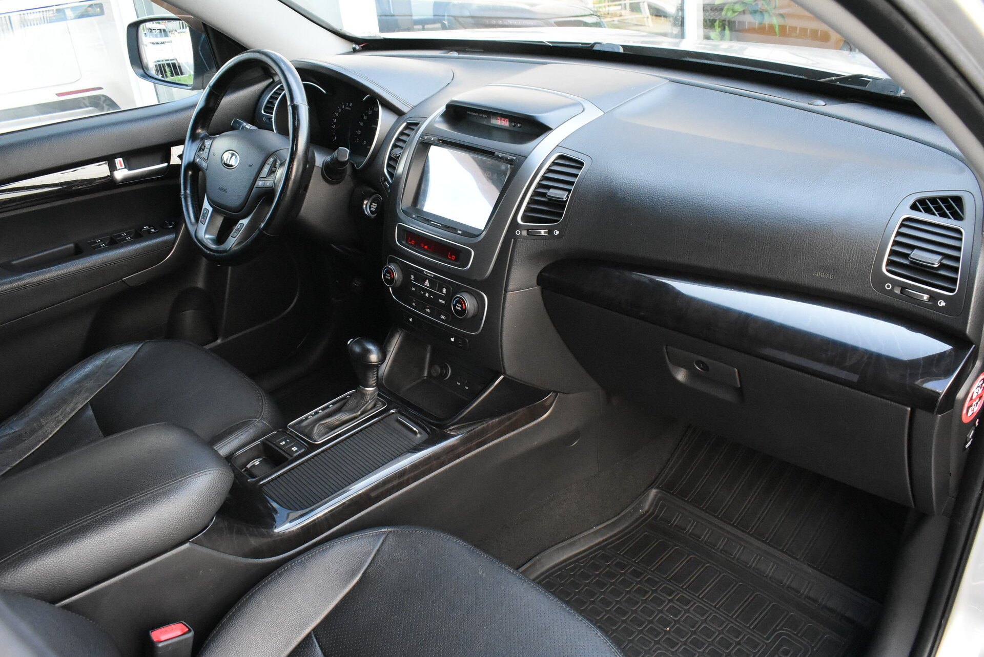 Kia Sorento, II Рестайлинг 2.4 AT (175 л.с.) 4WD 2012