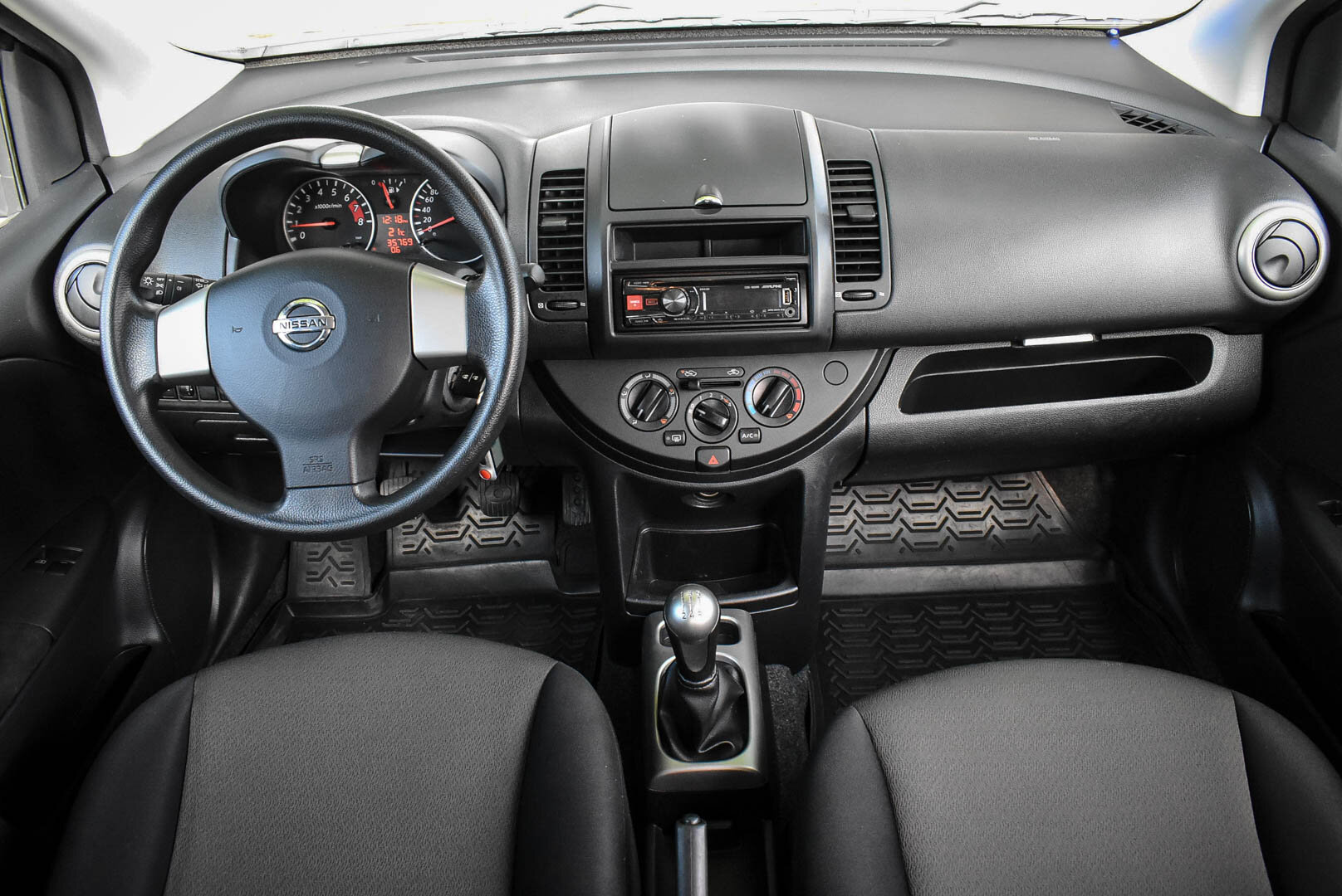 Nissan Note, I Рестайлинг 1.4 MT (88 л.с.) 2013