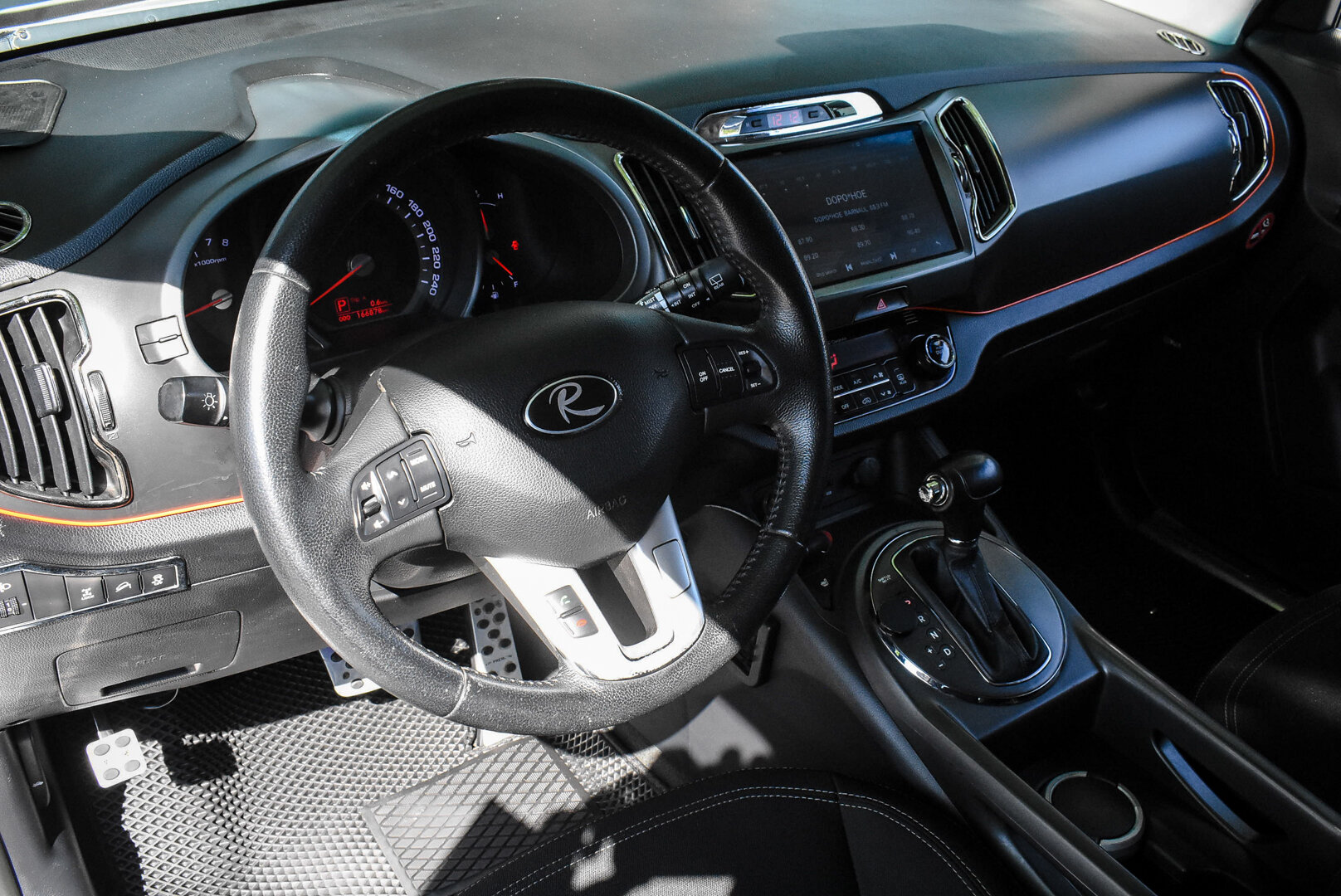Kia Sportage, III 2.0 AT (150 л.с.) 4WD 2012