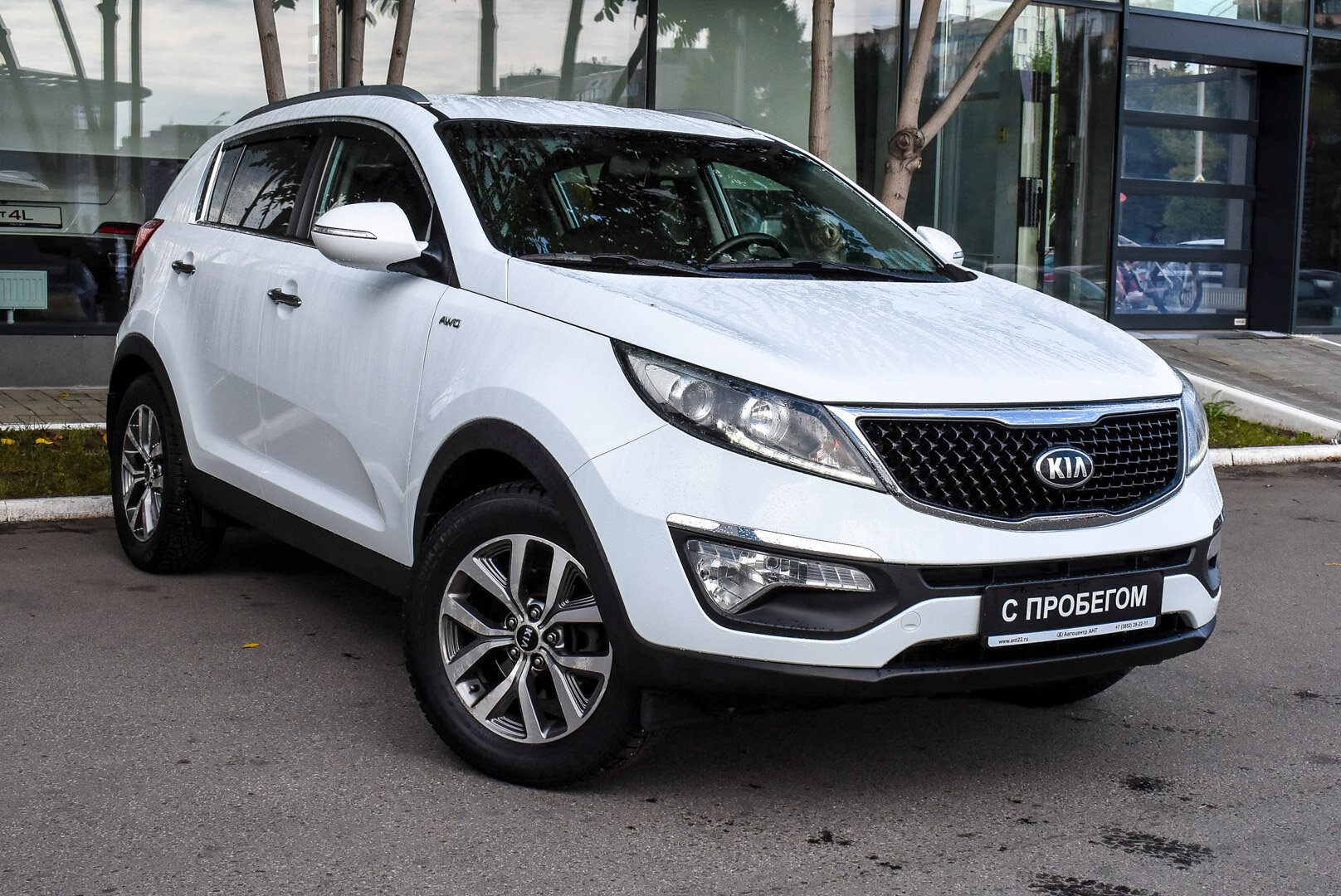 Kia Sportage, III Рестайлинг 2.0 AT (150 л.с.) 4WD 2014